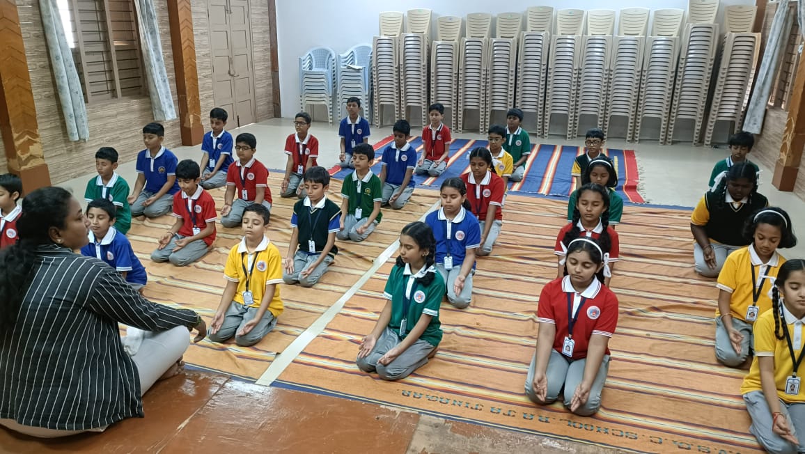 Primary students taking part in a team activity