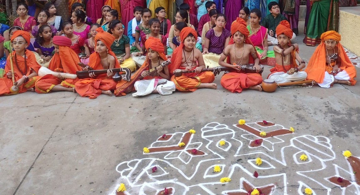 Primary students participating in a cultural activity